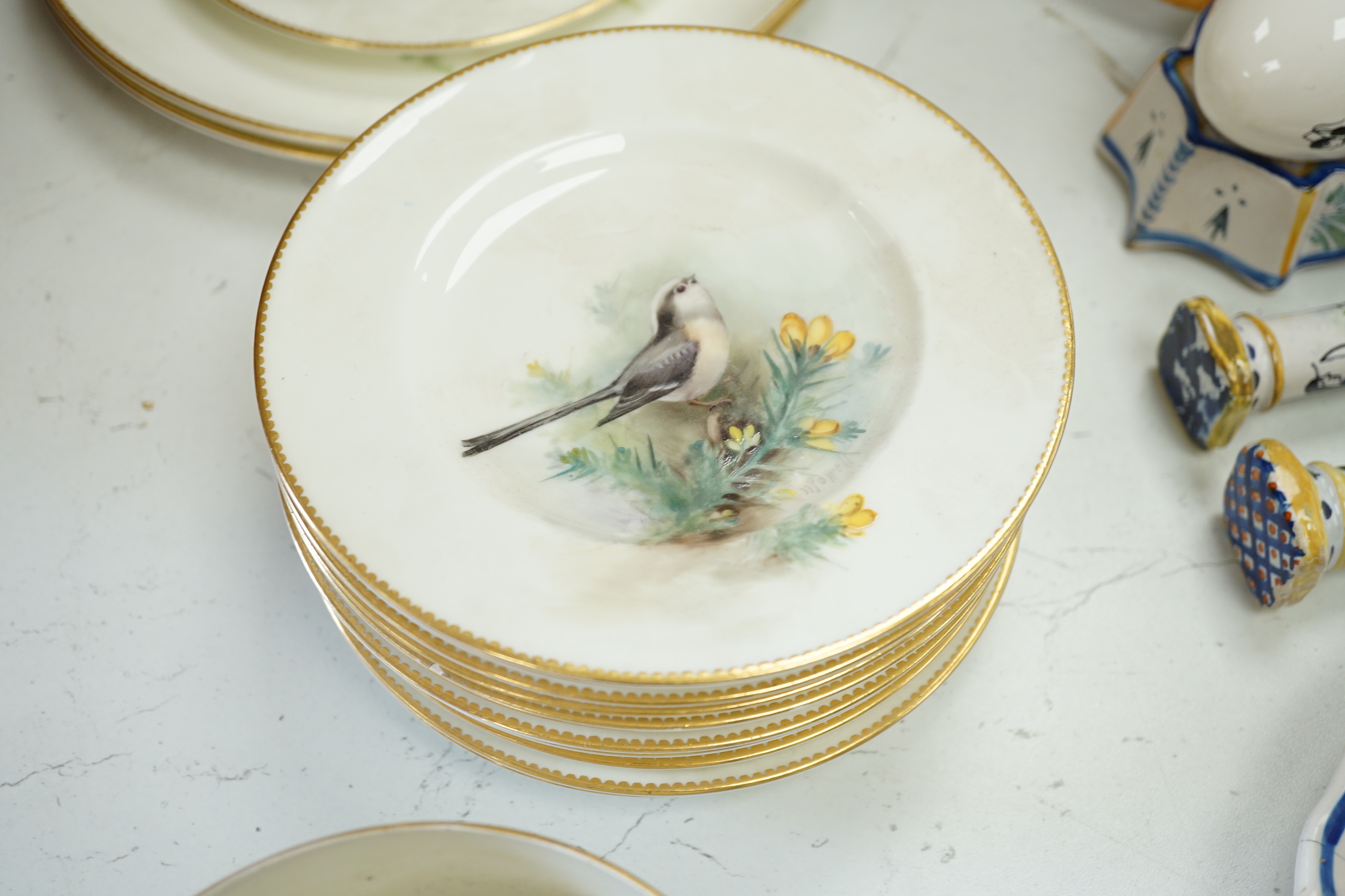 A Royal Worcester titled bird part tea set painted by W Powell